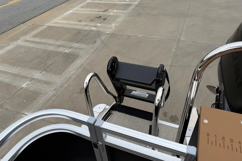 Slide: The Image of 2026 Avalon LSZ Rear Fish boat ladder on concrete surface. - 20