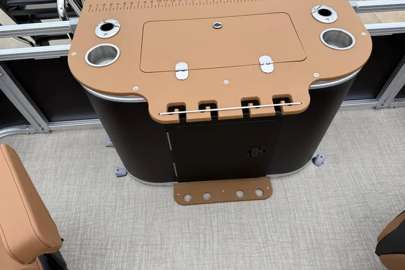 Slide: The Image of 2026 Avalon LSZ Rear Fish boat console with cup holders and storage compartments. - 22