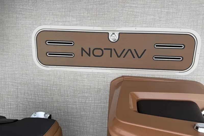 Slide: The Image of 2026 Avalon LSZ Rear Fish boat interior with logo and seating detail. - 28