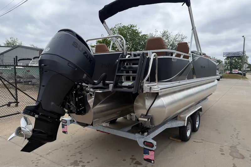 Slide: The Image of 2026 Avalon LSZ Rear Fish pontoon boat with Suzuki engine on trailer. - 3