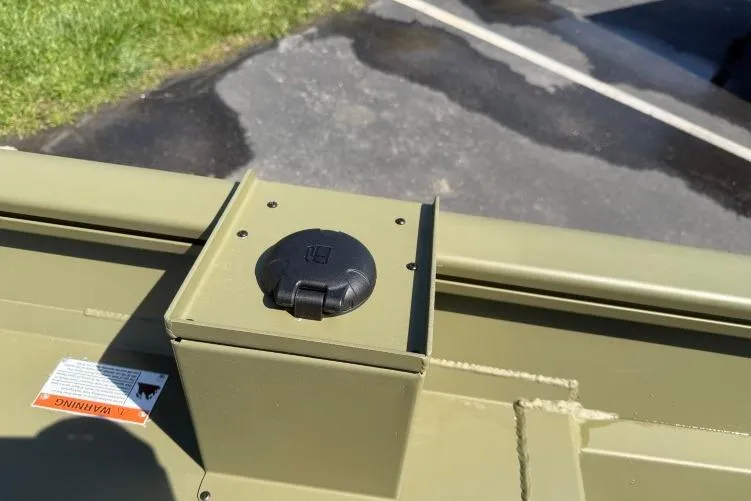 Slide: The Image of 2026 Crestliner 1870 Retriever FCC boat detail with a power outlet on deck. - 11