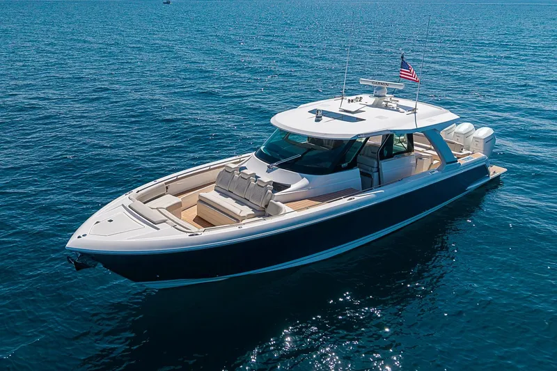 The Image of 2024 Tiara Yachts 48 LS luxury yacht cruising on open water. - 0