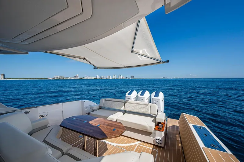Slide: The Image of 2024 Tiara Yachts 48 LS luxury yacht with spacious deck and ocean view. - 19