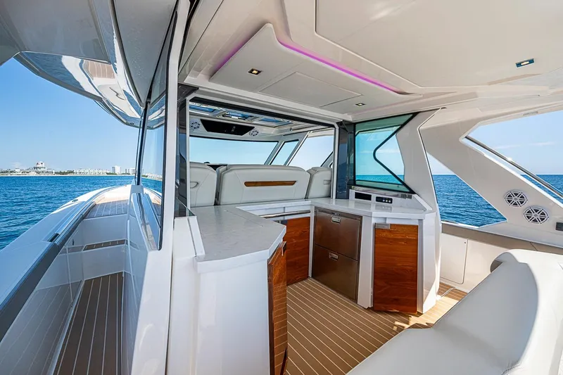 Slide: The Image of Luxurious interior of 2024 Tiara Yachts 48 LS with modern design and ocean view. - 25