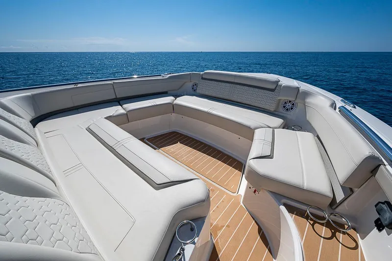 Slide: The Image of Luxurious seating area on 2024 Tiara Yachts 48 LS, overlooking the ocean. - 9