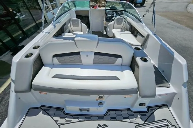 Slide: The Image of 2019 Four Winns HD220 boat interior with spacious seating and modern design. - 25