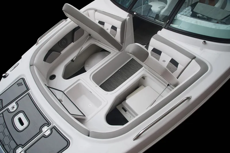 Slide: The Image of Manufacturer Provided Image: 2019 Four Winns HD220 boat interior with open storage compartments. - 9