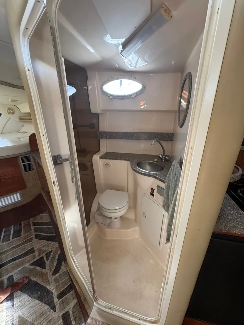 Slide: The Image of Interior view of bathroom on a 2005 Rinker Fiesta Vee 342 boat. - 15