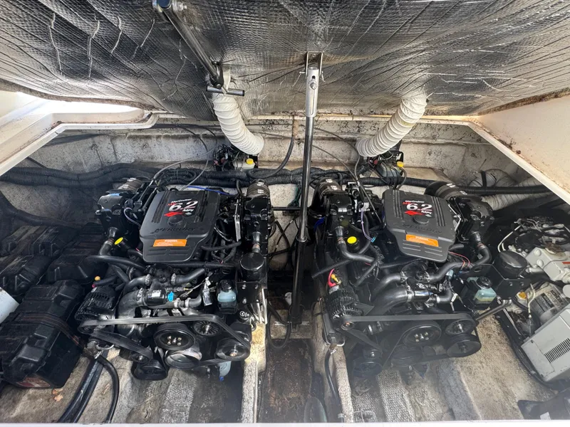 Slide: The Image of Engine compartment of 2005 Rinker Fiesta Vee 342 with dual engines. - 17