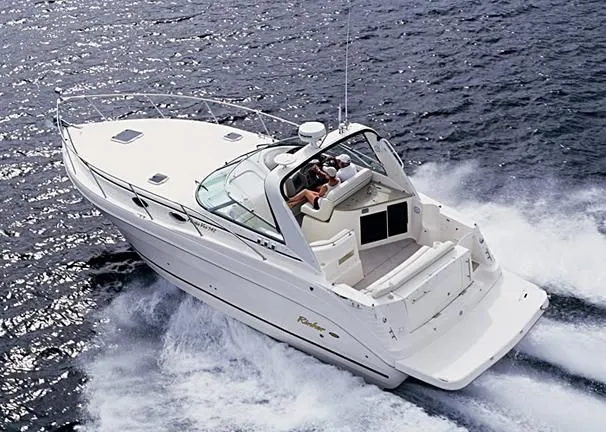 Slide: The Image of 2005 Rinker Fiesta Vee 342 cruising on the water. - 18
