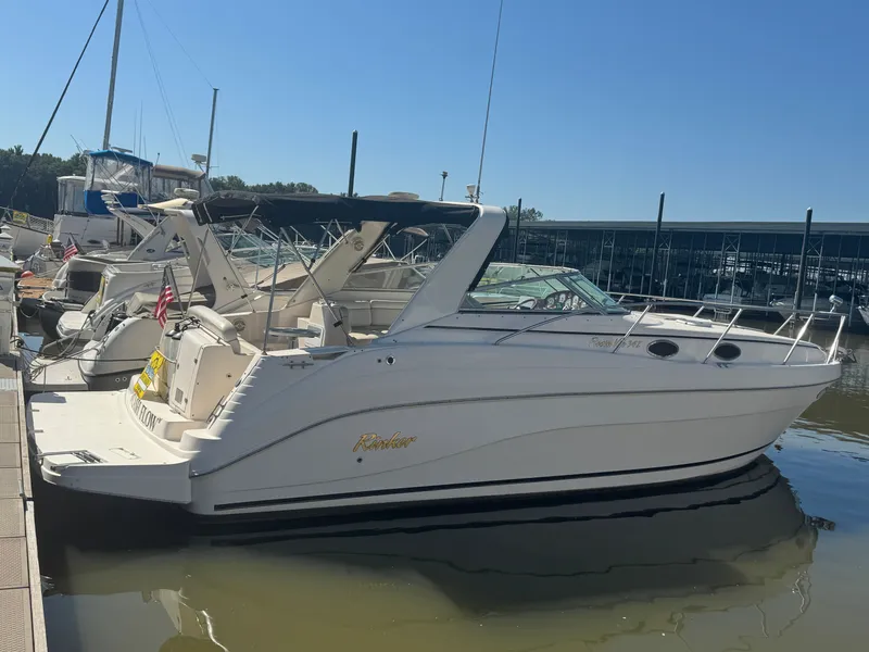 Slide: The Image of 2005 Rinker Fiesta Vee 342 boat docked at marina. - 3