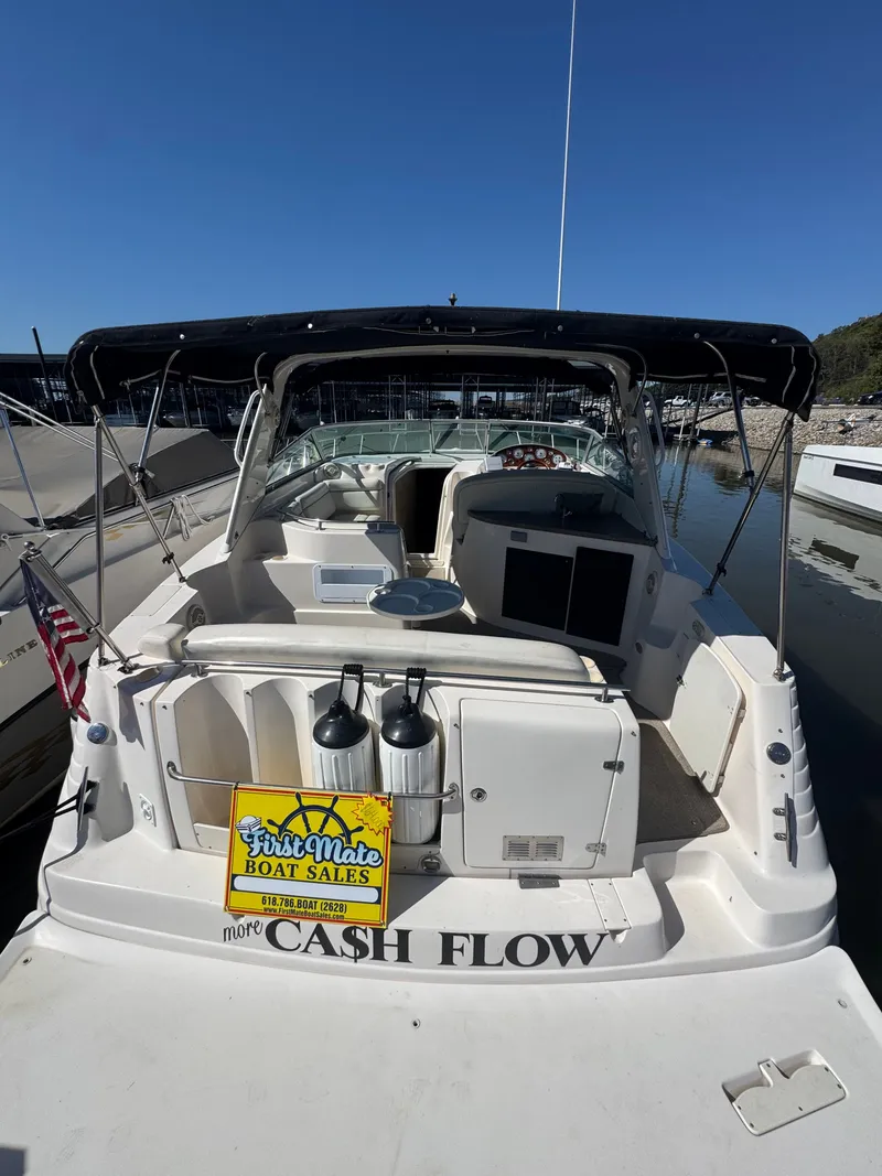 Slide: The Image of 2005 Rinker Fiesta Vee 342 boat docked with for sale sign. - 5