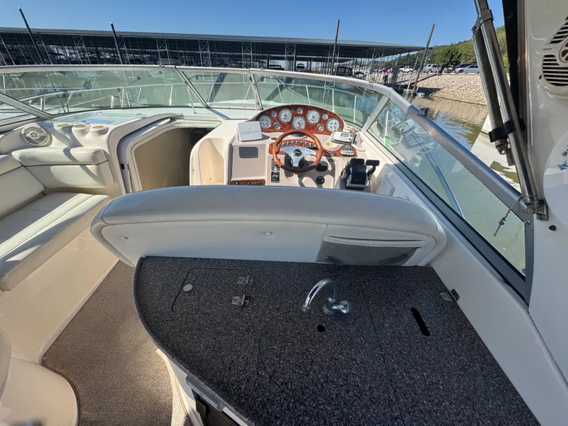 Slide: The Image of Interior of a 2005 Rinker Fiesta Vee 342 boat, cockpit view. - 7
