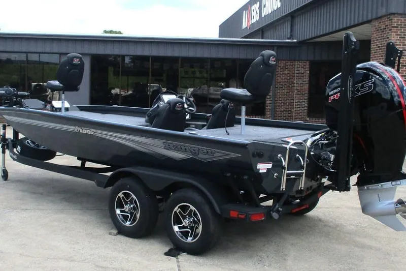 Slide: The Image of 2026 Ranger RT198P fishing boat with dual axle trailer and powerful outboard motor. - 3