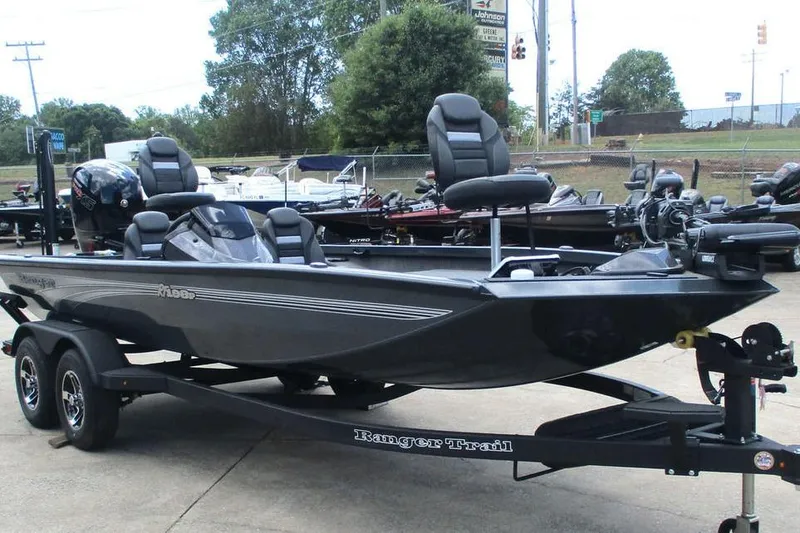 Slide: The Image of 2026 Ranger RT198P fishing boat on trailer, parked outdoors. - 4