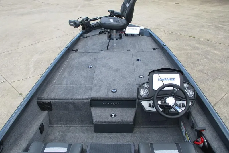 Slide: The Image of 2026 Ranger RT198P boat interior with steering wheel and fishing seat. - 9
