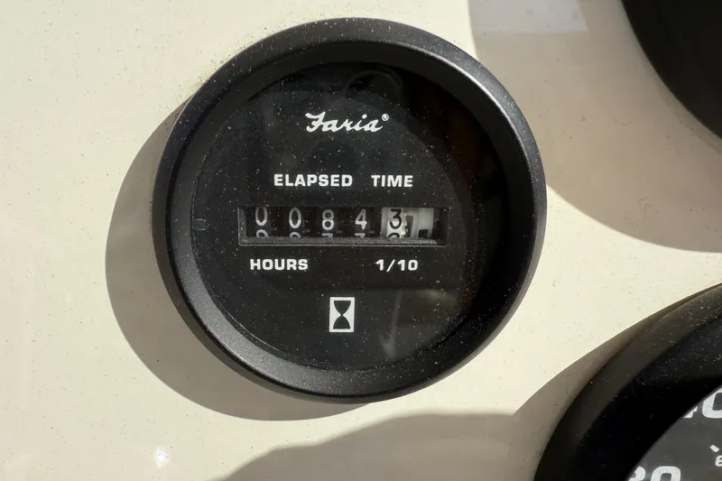 Slide: The Image of Hour meter showing 84.3 hours on a 2017 Key West 219 FS boat. - 35