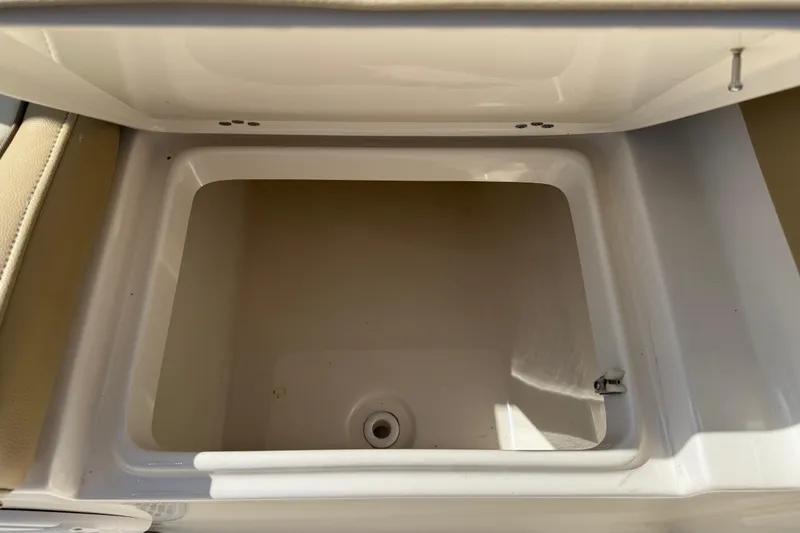 Slide: The Image of Open storage compartment on a 2017 Key West 219 FS boat. - 38