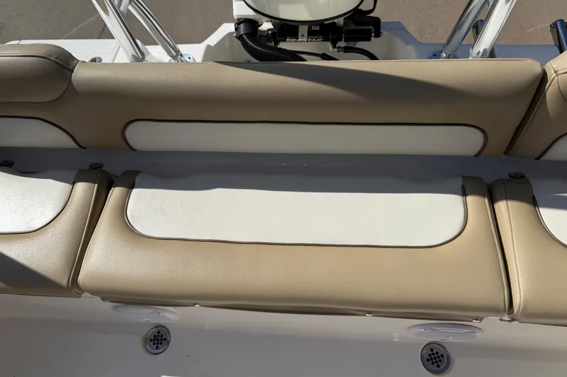 Slide: The Image of 2017 Key West 219 FS boat seating with beige and white upholstery. - 43