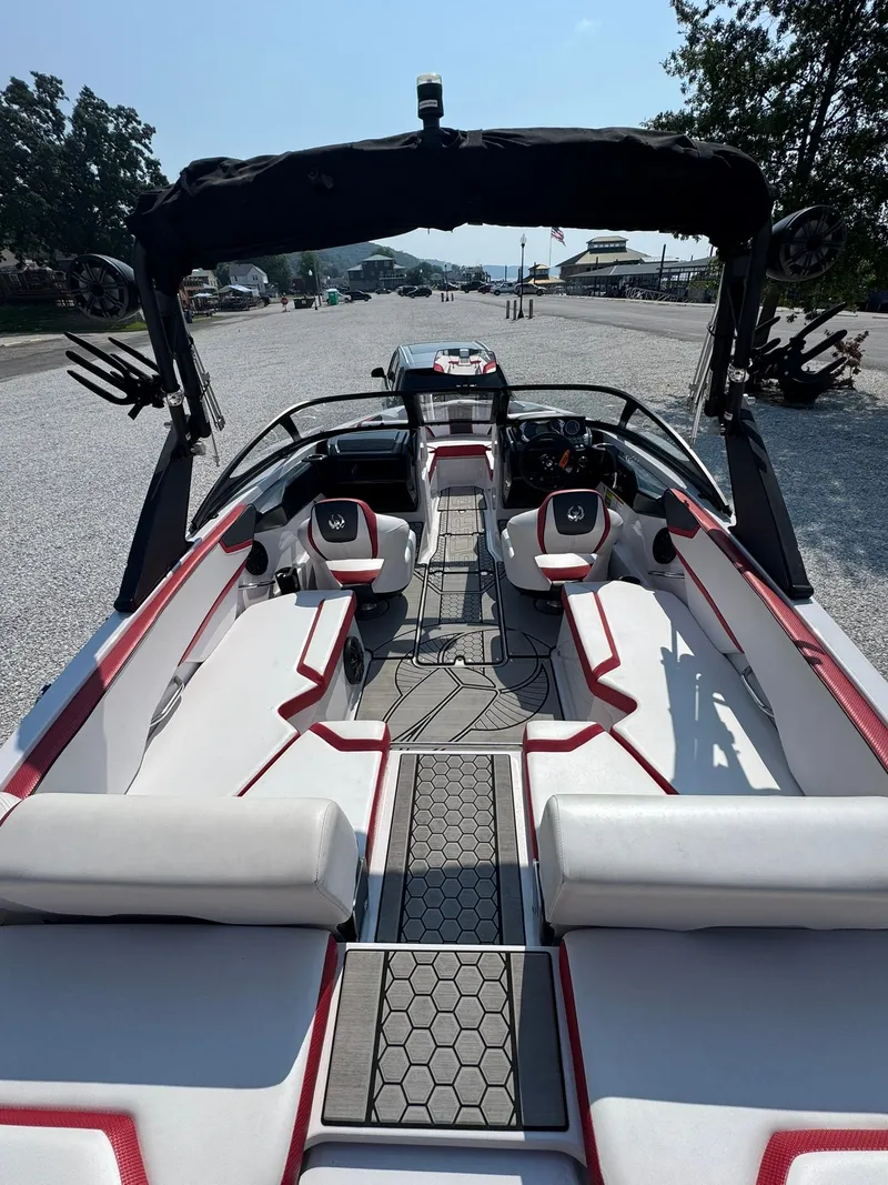 Slide: The Image of Interior view of a 2018 Scarab 215 ID boat with modern seating. - 10