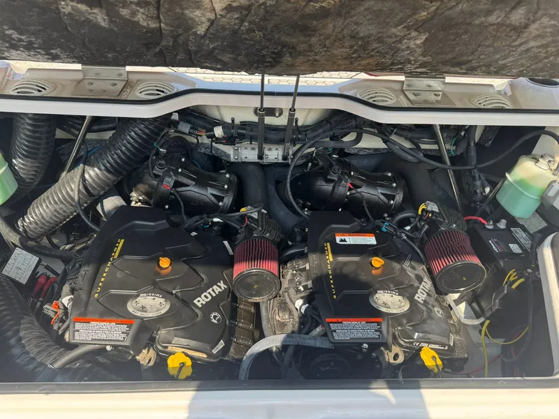 Slide: The Image of Engine compartment of a 2018 Scarab 215 ID with Rotax engines. - 17