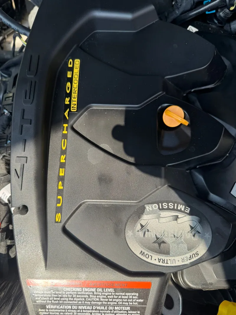 Slide: The Image of 2018 Scarab 215 ID engine cover with supercharged intercooler text. - 19