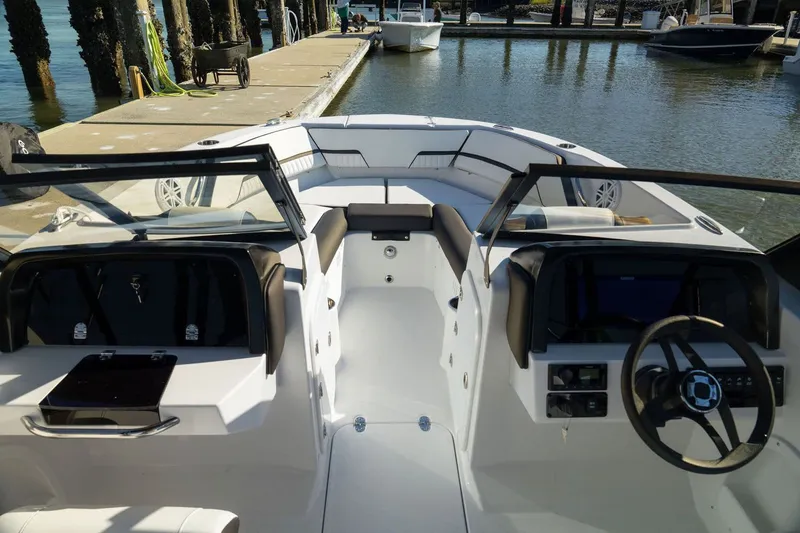 Slide: The Image of Interior view of 2026 Stingray 20 SBX boat at dock. - 6