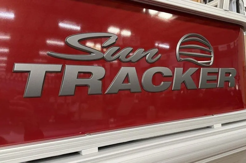 Slide: The Image of 2026 Sun Tracker Bass Buggy 18 DLX logo on red background. - 5