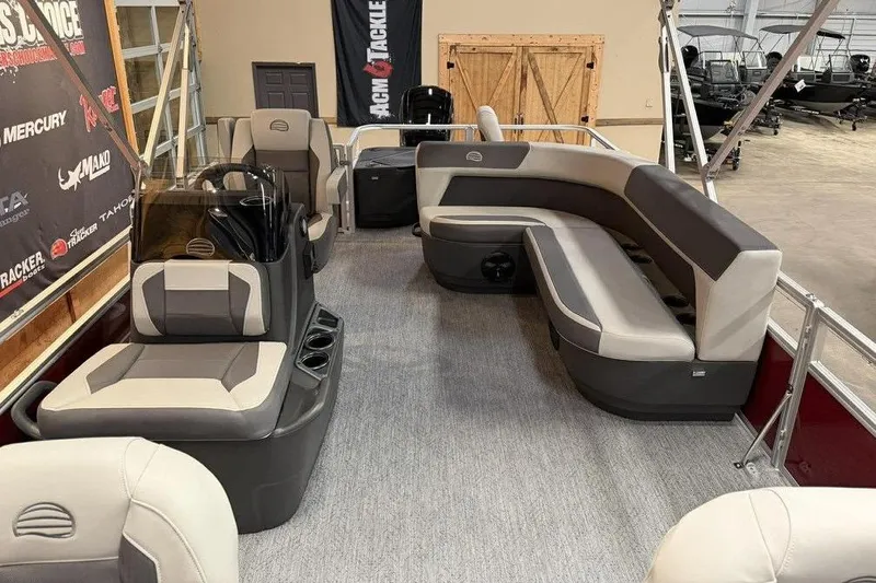 Slide: The Image of 2026 Sun Tracker Bass Buggy 18 DLX pontoon boat interior with spacious seating and modern design. - 6