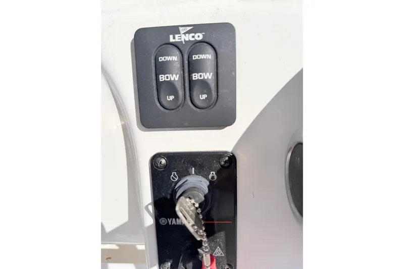 Slide: The Image of Control panel of a 2015 Tidewater 230 CC Adventure boat with Lenco trim tabs. - 15