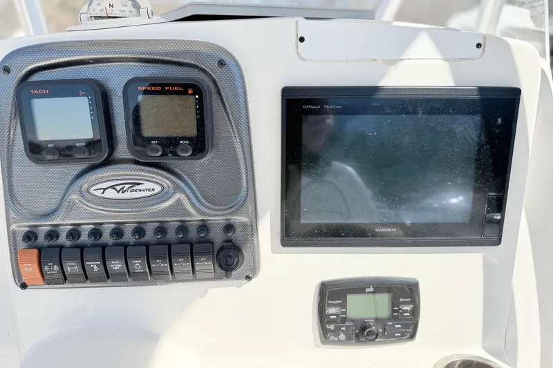 Slide: The Image of Dashboard of 2015 Tidewater 230 CC Adventure boat with Garmin GPS and control panel. - 17