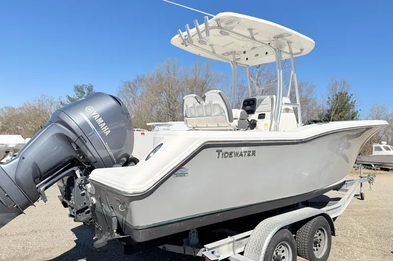 Slide: The Image of 2015 Tidewater 230 CC Adventure boat on trailer with Yamaha engine. - 2