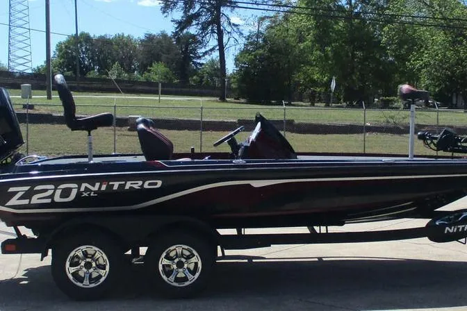 The Image of 2026 Nitro Z20 XL Pro boat on trailer, parked outdoors. - 0