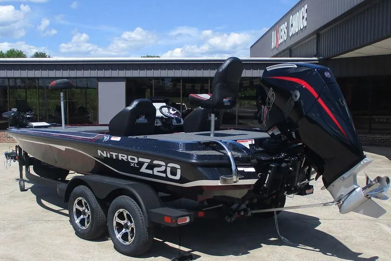 Slide: The Image of 2026 Nitro Z20 XL Pro boat with powerful outboard motor, parked outside dealership. - 5