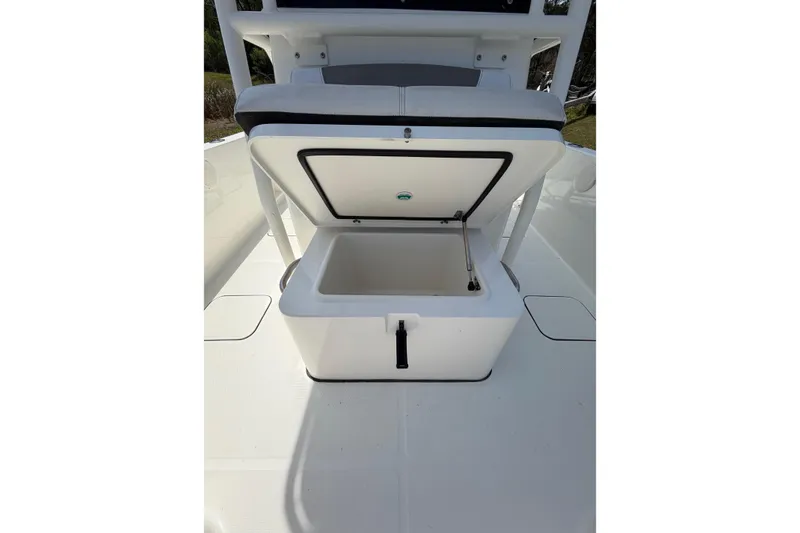 Slide: The Image of Open storage compartment on 2019 World Cat 230 CC boat. - 25