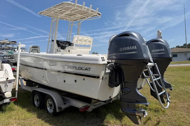 Slide: The Image of 2019 World Cat 230 CC boat with twin Yamaha engines on a trailer. - 4