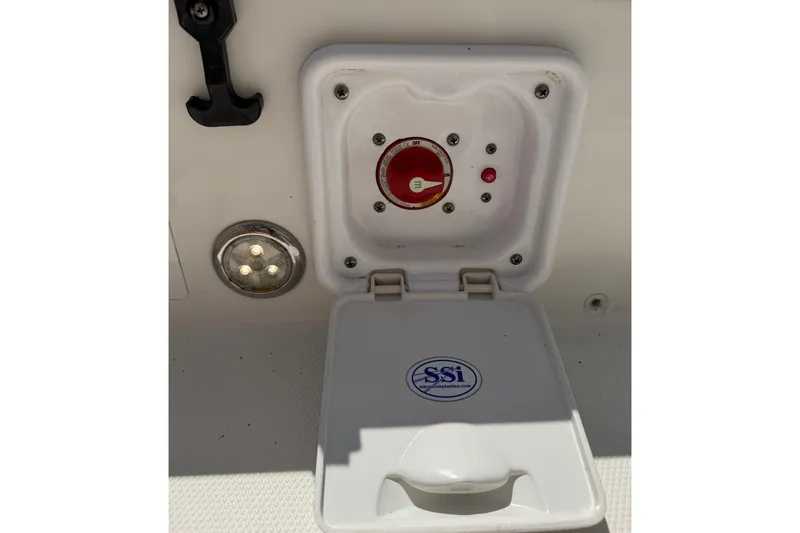 Slide: The Image of Control panel on a 2019 World Cat 230 CC boat with SSI logo. - 42