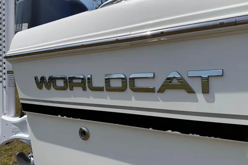 Slide: The Image of 2019 World Cat 230 CC boat logo on white hull. - 53