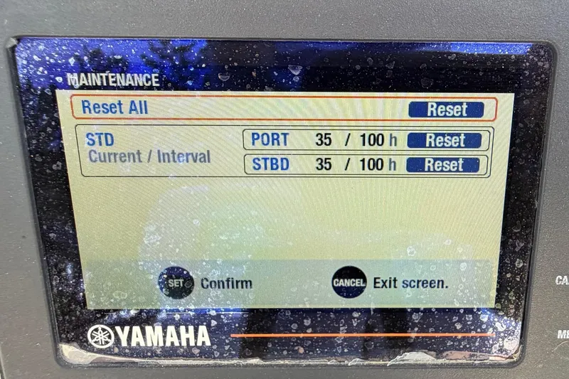Slide: The Image of Yamaha maintenance screen on 2019 World Cat 230 CC boat, showing reset options. - 57