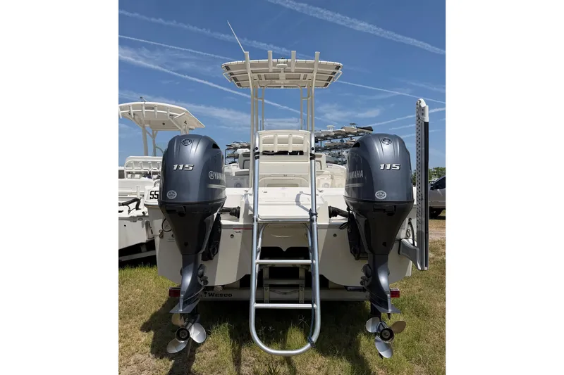 Slide: The Image of 2019 World Cat 230 CC boat with dual Yamaha 115 engines, rear view. - 6