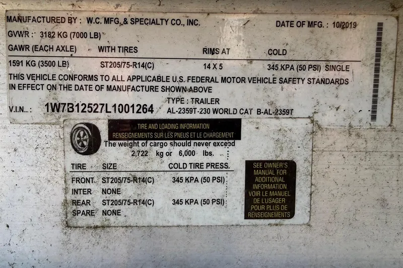 Slide: The Image of 2019 World Cat 230 CC trailer label with tire and loading information. - 65