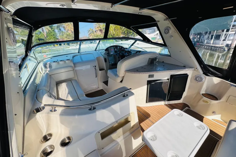 Slide: The Image of Interior of 2002 Rinker Fiesta Vee 342 boat with seating and helm station. - 19