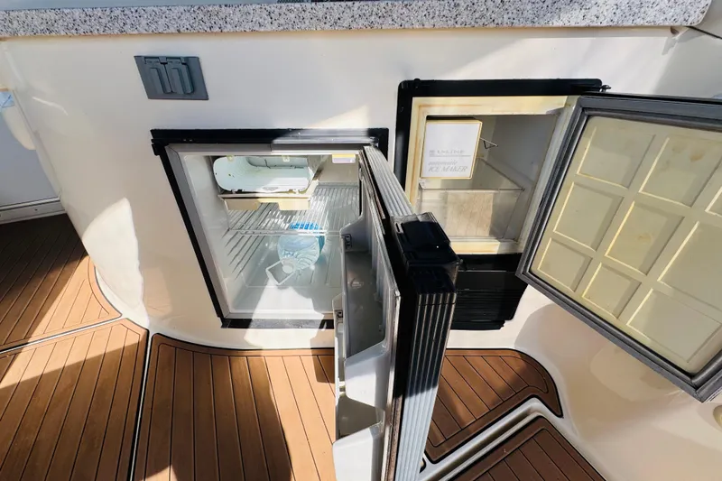 Slide: The Image of Open refrigerator and ice maker on 2002 Rinker Fiesta Vee 342 boat deck. - 23