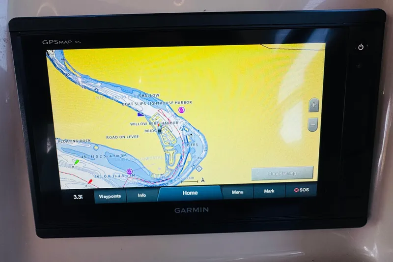 Slide: The Image of Garmin GPS display on 2002 Rinker Fiesta Vee 342 boat, showing nautical map. - 28