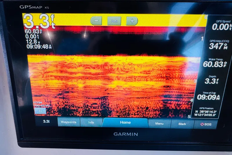 Slide: The Image of Garmin GPS display on 2002 Rinker Fiesta Vee 342 showing depth and water temperature. - 29
