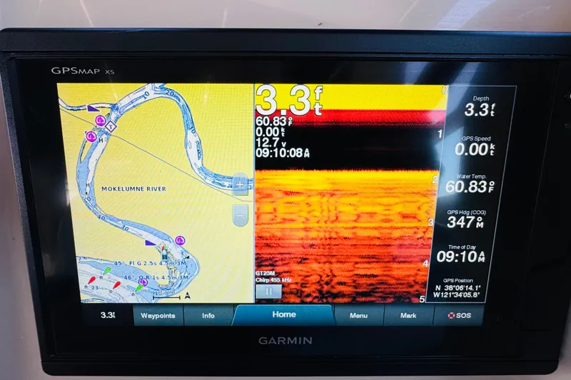 Slide: The Image of Garmin GPS display on 2002 Rinker Fiesta Vee 342, showing Mokelumne River navigation. - 30