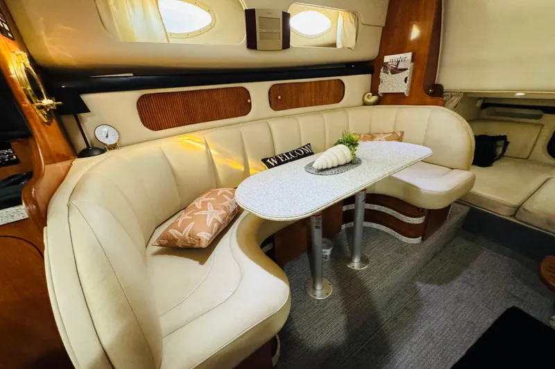 Slide: The Image of Interior of 2002 Rinker Fiesta Vee 342 yacht with elegant seating and decor. - 38