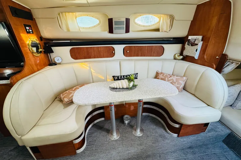 Slide: The Image of Interior of 2002 Rinker Fiesta Vee 342 with cozy seating and elegant decor. - 40