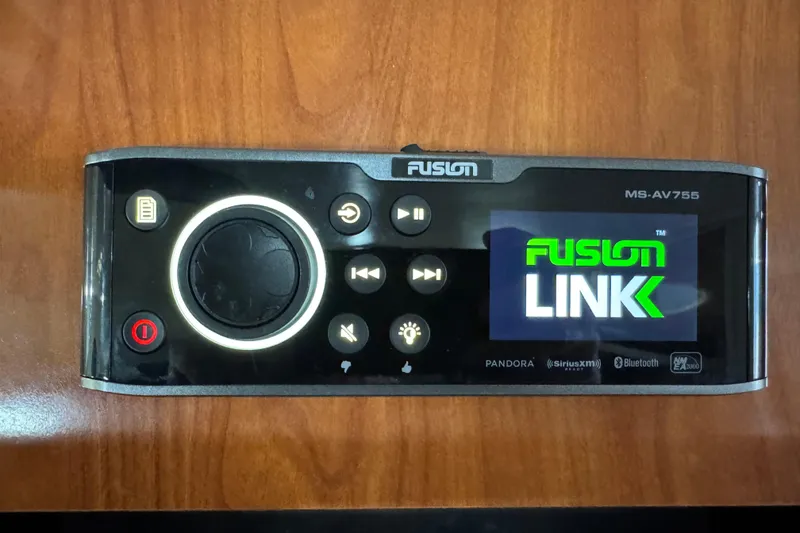 Slide: The Image of Fusion MS-AV755 stereo system on 2002 Rinker Fiesta Vee 342 boat dashboard. - 49