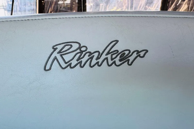 Slide: The Image of Rinker logo on 2002 Fiesta Vee 342 boat interior upholstery. - 57